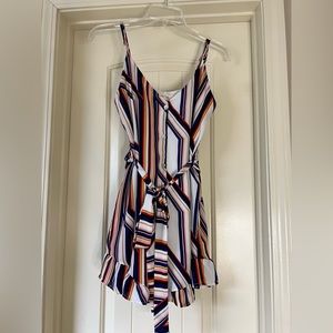 Retro Vibe Romper with ruffled leg opening